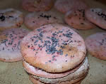 Pink crackers with poppy seeds